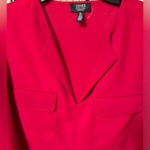 New red blouse with front pockets. I wore it once it’s just too large for me.